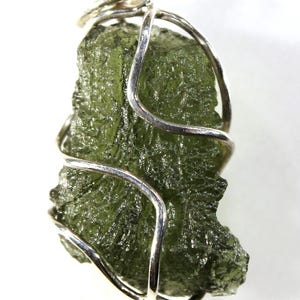 Pendant - moldavite in a silver cage, real Czech moldavite from locality &quot;CHLUM&quot;, year 2024, 2.16 grams, 19x11x6 mm, yellowish green (89/54)