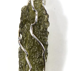 Pendant - moldavite in a silver cage, real Czech moldavite from locality &quot;CHLUM&quot;, year 2024, 1.95 grams, 27x9x5 mm, yellowish green (85/54)