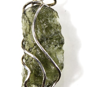 Pendant - moldavite in a silver cage, real Czech moldavite from locality &quot;CHLUM&quot;, year 2024, 1.65 grams, 22x10x4 mm, yellowish green (82/54)