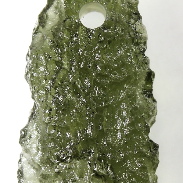 Drilled natural Czech moldavite from locality Chlum, year 2023, 1.68 grams, 24x11x5 mm, yellowish green color, hole 2 mm (code: XR 40/16)