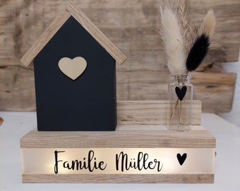 Black house illuminated with heart, desired name, glass vase of dried flowers in a wooden frame, personalized gift set for moving in/friends/home