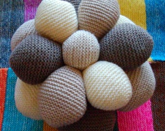 45 by 17 cm beige, brown tinted decorative cushion