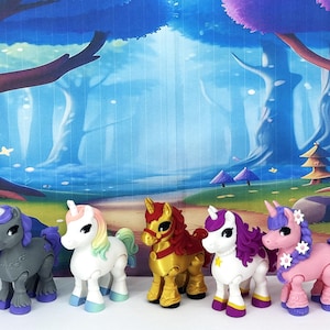 May include: A set of three ceramic mugs with a speckled, matte finish. The mugs are in shades of cream, light gray, and dark gray. Each mug has a simple, minimalist design, perfect for coffee or tea.