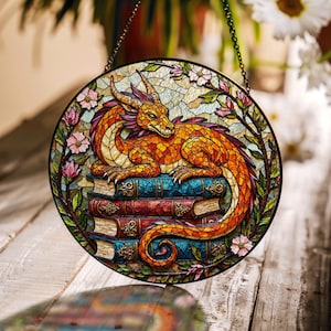 Sleeping dragon on antique books fantasy stained glass suncatcher gift for book lovers