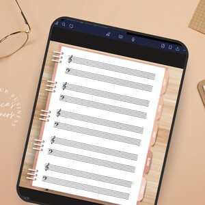 Puede incluir: Una p&aacute;gina de planificador digital con una hoja de pentagrama musical en blanco. La p&aacute;gina tiene pesta&ntilde;as etiquetadas como "Reuni&oacute;n", "Objetivos", "Ideas", "Tareas" y "Notas".
