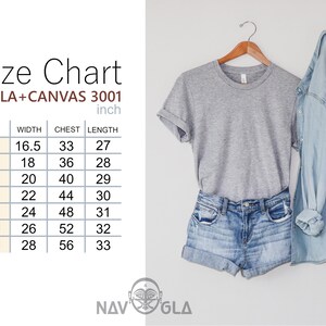May include: A grey Bella+Canvas 3001 t-shirt, denim shorts, and a light blue denim shirt hanging on a wooden hanger. A size chart is displayed on the left, with measurements in inches for various sizes.