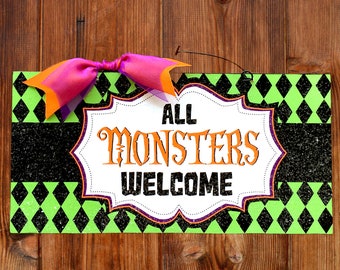 All Monsters Welcome sign.