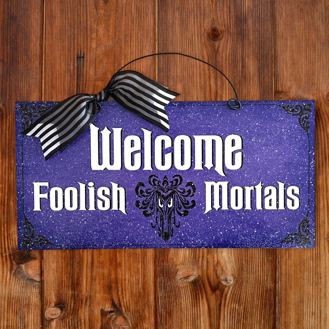Welcome Foolish Mortals Haunted Mansion sign.