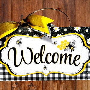 Daisy and Bee Welcome sign.