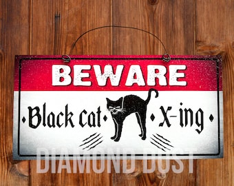 Black Cat crossing sign.