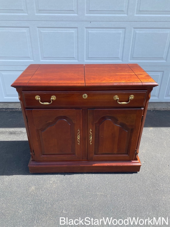 Flip top 2024 bar cabinet