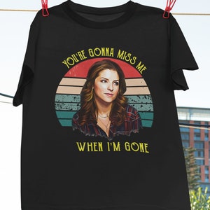 Könnte beinhalten: Schwarzes T-Shirt mit einem Vintage-Grafikdruck einer Frau mit dem Text "You're gonna miss me when I'm gone".