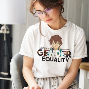 May include: White t-shirt featuring a cartoon anime character and the text "Advocate of True Gender Equality".