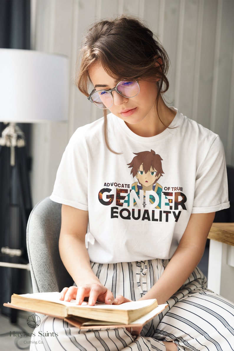 May include: White t-shirt featuring a cartoon anime character and the text "Advocate of True Gender Equality".