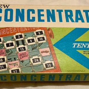 May include: A vintage game box for the game Concentration, featuring a green and blue color scheme with the title "NEW CONCENTRATION GAME" in bold, white letters. The box also includes the text "TENTH edition" with a star and the words "WITH ROLOMATIC PUZZLE CHANGER".