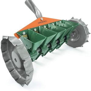 May include: A green and orange four-row seed planter with two wheels. The planter has a handle and the text "VAROMORUS" is printed on the orange part.
