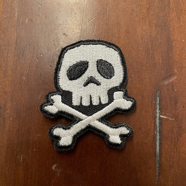 Embroidered Skull and Crossbones patch with hook type backing