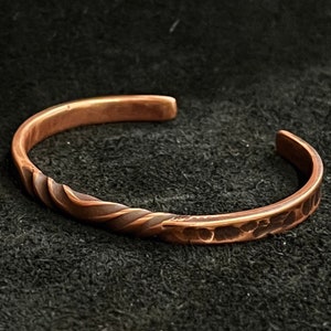 Thin gauge. Twisted Copper Bracelet. Forged in Montana. Made in America. Rugged. Biker jewelry. Men’s. Women’s. Health. Blacksmith.