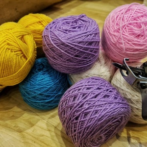 Materials used to make this rug, yarn and tufting gun