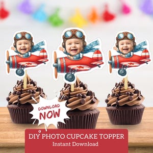 May include: Three cupcakes topped with DIY photo cupcake toppers. Each topper features a smiling baby in a red airplane with brown goggles and a blue scarf. The cupcakes have chocolate frosting and chocolate chips. Text on the image says "DOWNLOAD NOW" and "DIY PHOTO CUPCAKE TOPPER Instant Download".