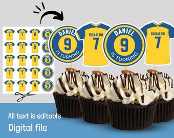 May include: Printable soccer-themed cupcake toppers with a blue and yellow design. The toppers feature a soccer jersey with the name "Daniel" and the number "9" on a blue circle with the text "is turning". There are also toppers with the name "Ronaldo" and the number "7" on a yellow jersey.