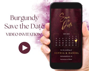 May include: A burgundy save the date video invitation with gold text. The invitation features a calendar with the date May 2025 highlighted. The text reads "Save the Date" and "For the wedding of Sophia & Daniel, Indianapolis, IN. Invitation to follow."