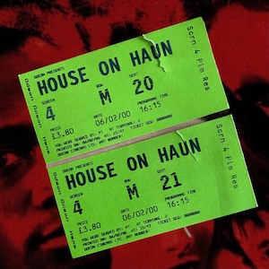 May include: Two green tickets for the movie "House on Haunted Hill" at the Odeon cinema. The tickets are for screen 4, row M, seats 20 and 21. The date is 06/02/00 and the time is 16:15. The price is £3.80.