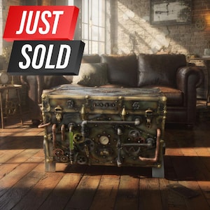 May include: A steampunk-style trunk with intricate metalwork, gears, and pipes. The trunk is a mix of green and gold, with a weathered appearance. The words "JUST SOLD" are displayed in red and black.
