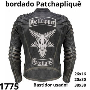 May include: A black leather jacket with a large white embroidered patch featuring a goat head and the text "Hellripper" and "Scotland". The jacket has a distressed appearance with ribbed detailing on the shoulders and sleeves. The image also includes the measurements 26x16, 20x30, and 38x38.