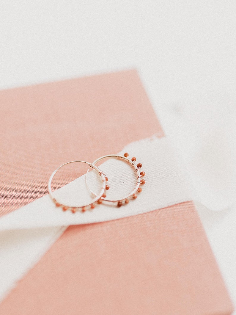 Hoop earrings with tiny 2.5mm golden aventurine gems. These earrings are dainty and minimalist, with a bohemian touch, and are rose gold plated. The tiny aventurine beads on these earrings are well seen.