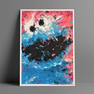 May include: Abstract painting with a white border. The artwork features bold brushstrokes in shades of pink, blue, black, and white. The artist's signature is visible in the bottom right corner. The painting is a modern piece of art.