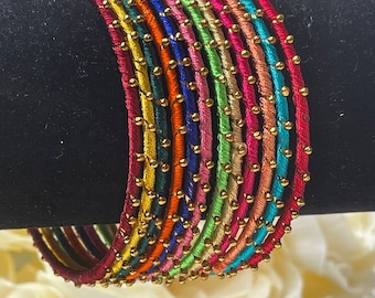 Izhaar Designer Multicolor Bangles For Girls And Womens, For Their Special Occasions And Family Functions.