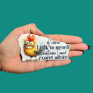 May include: A sticker featuring a cartoon chicken with a large smile and the text "Of course I talk to myself sometimes I need expert advice." The chicken is yellow, orange, and blue.
