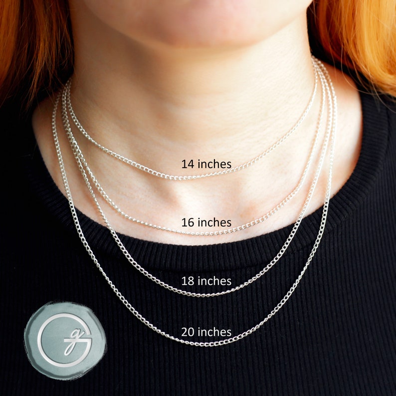 Different necklace lengths on an adult woman. 14, 16, 18 & 20 inch chains are worn. The 14” chain is a choker fit. 16” falls on the collarbone. 18” and 20” chains have a more relaxed, draping fit.