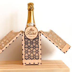 Personalised champagne gift box displayed open, showing the top half folding out to reveal the box contents. Bottle not included with your order.