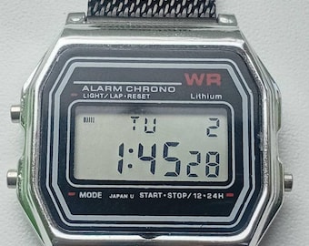 Retro vintage digital LCD watch with multifunctional alarm (chronograph). In excellent condition.
