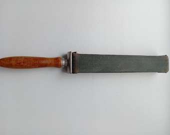Een apparaat voor het slijpen van scheermessen, "Belt". Vintage, jaren 1950-1960. USSR. Gebruikt.