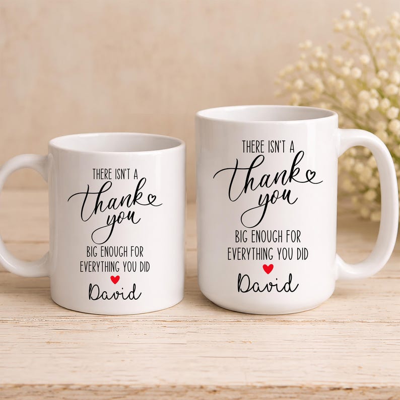 May include: A set of three ceramic mugs with a speckled, matte finish. The mugs are in shades of cream, light gray, and dark gray. Each mug has a simple, minimalist design and a rounded handle.