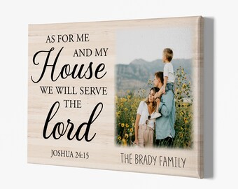 May include: A wood canvas print with a family photo and the text "As for me and my house we will serve the Lord Joshua 24:15 The Brady Family". The photo shows a family of three standing in a field of sunflowers.
