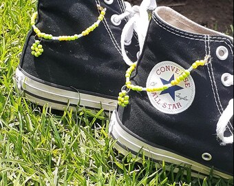 shoes with chains on them