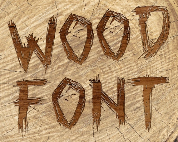 Premium Vector  Jungle hand lettering wooden text textured