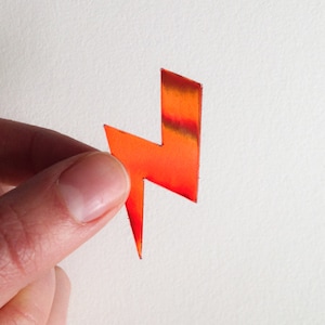 Prachtige holografische sticker "Eclair" klein rood model