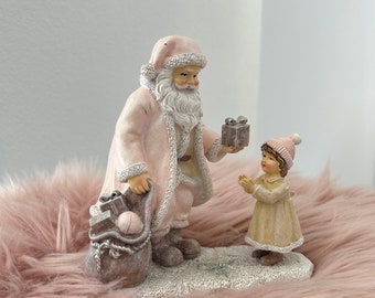 Santa Claus figure with child