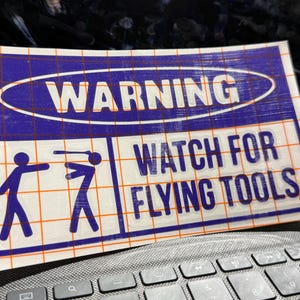 Watch For Flying Tools