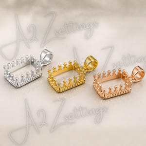 May include: Three rectangular crown-shaped pendant settings in silver, gold, and rose gold. Each pendant has a loop for a chain and a detailed crown design around the edges. The background has the text "A2 Z settings".