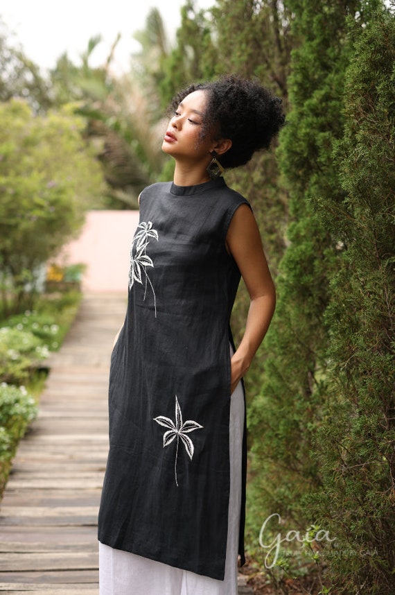 black dress with white embroidery Nanette Lepore its complete with a comfortable shirred waist and tank straps Women's Plus Size Hana Ruffle