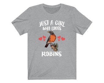 May include: Grey t-shirt with the text "Just a girl who loves Robins" and a robin perched on a branch with three red hearts.