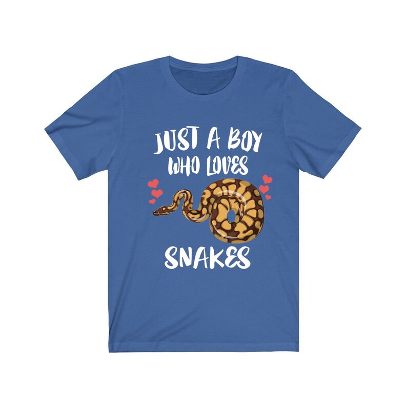 May include: A royal blue t-shirt with the text "Just a boy who loves snakes" in white. A cartoon snake with brown and yellow scales is in the centre of the shirt. Three small red hearts are above the snake.