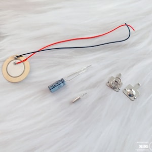 Tamagotchi Capacitors |Crystal resonators|Battery tabs |Speaker - Piezo Buzzer