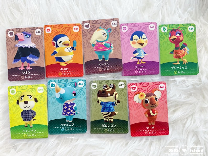 May include: A collection of Animal Crossing character cards, each featuring a different animal villager illustration. The cards have unique designs and Japanese text. The cards are numbered and have character names.
